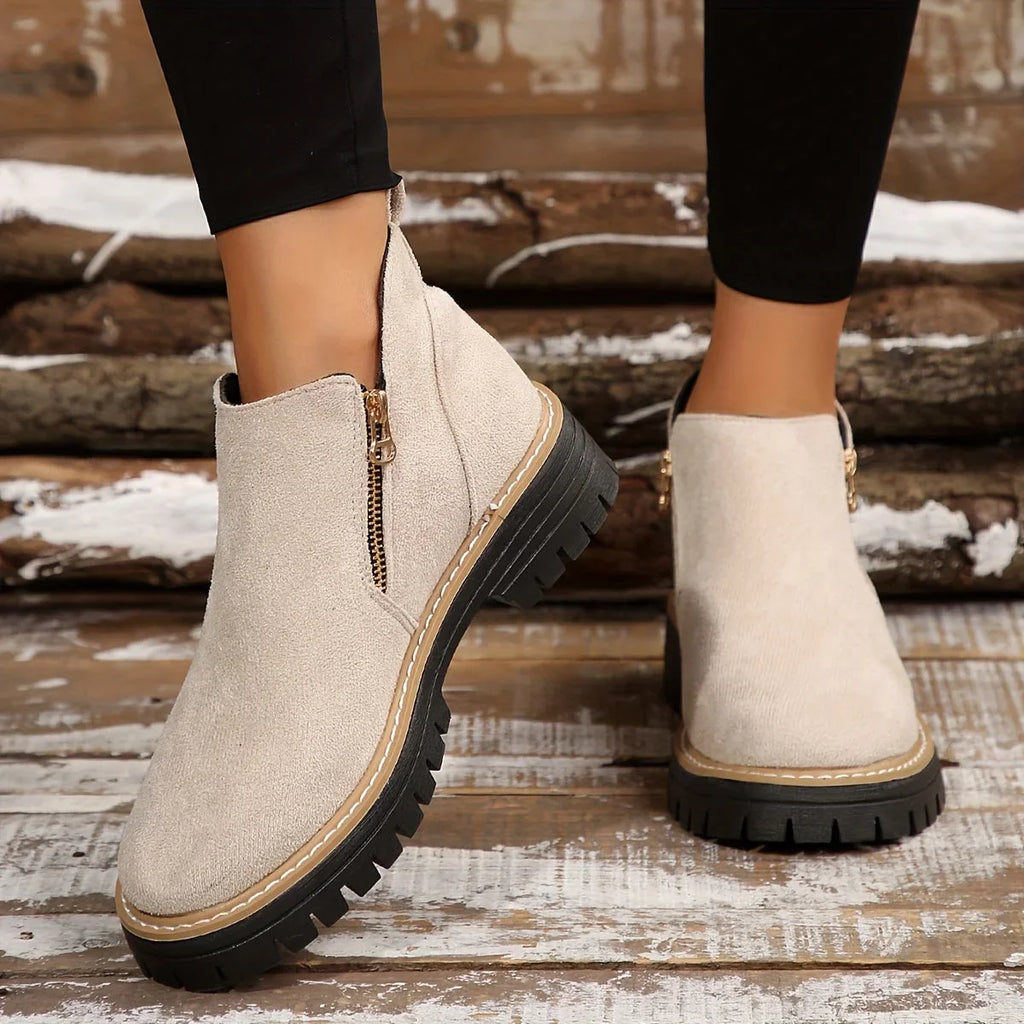 Damen-Ankle-Boots aus Leoparden-Veloursleder mit seitlichem Reißverschluss und grober Profilsohle