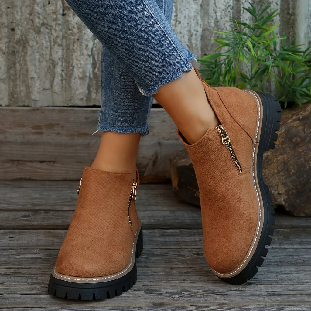Damen-Ankle-Boots aus Leoparden-Veloursleder mit seitlichem Reißverschluss und grober Profilsohle