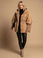 Oversized-Steppjacke für Damen mit Kunstfellbesatz und Kapuze